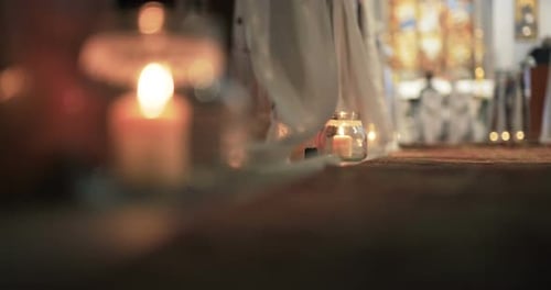 Few Lit Candles In Church