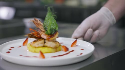 Gourmet Shrimp Dish Preparation in Restaurant Kitchen