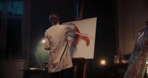Woman Artist Paints a Picture