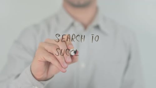 Search To Success Writing on Screen with Hand