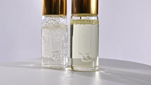 Luxury Serum in Glass Bottles with Golden Lids