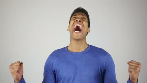 Young Man Screaming in Anger