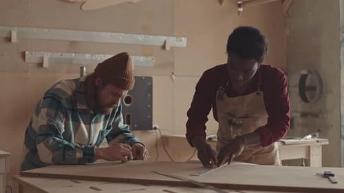 Artisans Working Together in a Woodshop