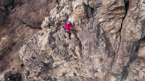 Rock Climbing Training on Steep Slope in Mountains