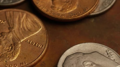 Rotating stock footage shot of American monetary coins