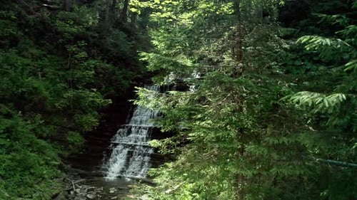Aerial Drone View Waterfall in the Forest in Sunlight. V3
