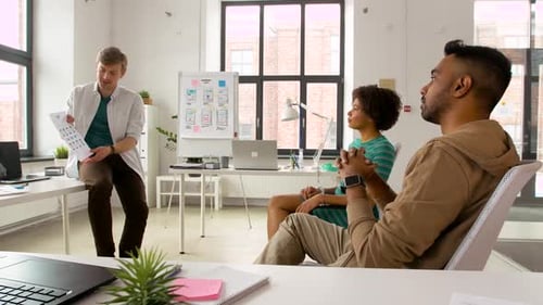 Young Adults Collaborating in Modern Office Meeting