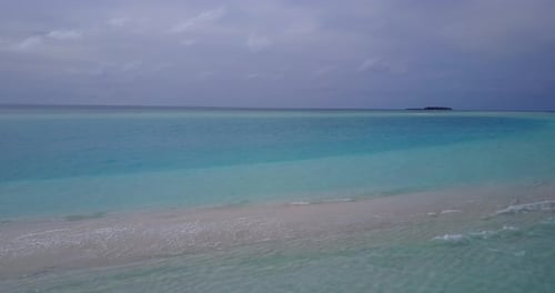 Tropical aerial abstract shot of a sunshine white sandy paradise beach and aqua turquoise water back