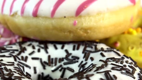 Delicious donuts with colorful icing