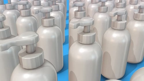 Múltiples dispensadores de jabón blanco y limpio seguidos 4k