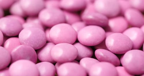 Pile of Shiny Pink Candy Pieces Close Up