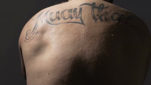 View on Muay Thai Boxer Back With Tattoos Strong Man Training Before Fight