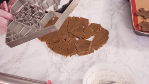 Cutting Festive Gingerbread Cookies at Home
