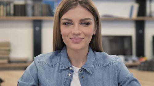 Smiling Young Woman Close-up Portrait Indoors