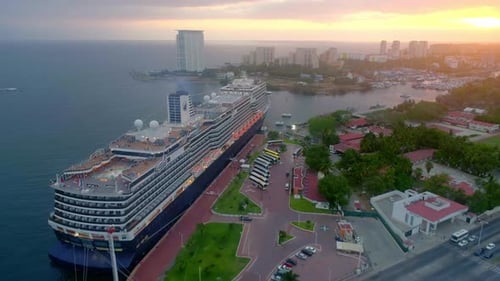 Cruise Ships Docked at City Port at Sunset