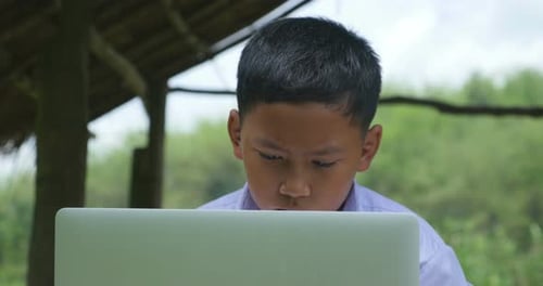 Rural Boy Studying Learning With Laptop