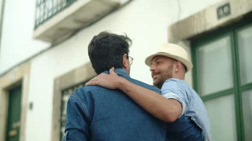 Affectionate Couple Embracing on European City Street