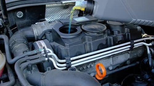 Adding Motor Oil to Car Engine