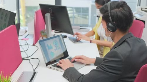 Group of Asian team business man and woman people wear face mask, working in office with new normal