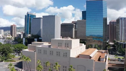 Aerial rising shot of downtown Honolulu on the island of O'ahu, Hawaii. 4K
