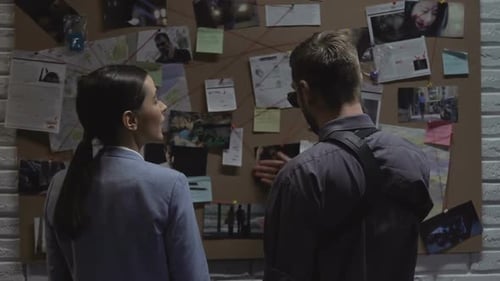 Man and Woman Arguing on Workplace Police Department Discussing Crime Details