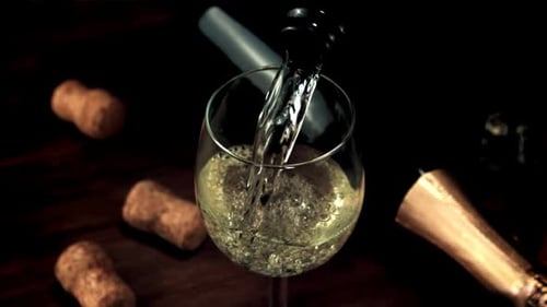 Champagne Pouring into Glass for a Celebration
