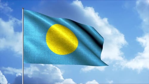 Waving Flag of Palau Against Blue Sky Background