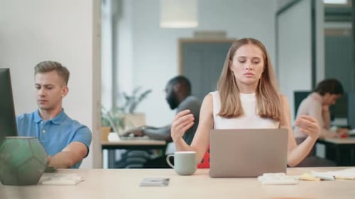 Business Woman Relaxing After Work in Office