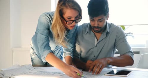Office Coworkers in Business Meeting Discussing Project Plans