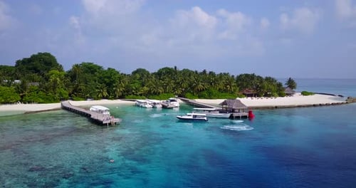 Island In Maldives - Tropical Paradise Of Palm Trees And White Sand With Boats, Wooden Footbridge, A