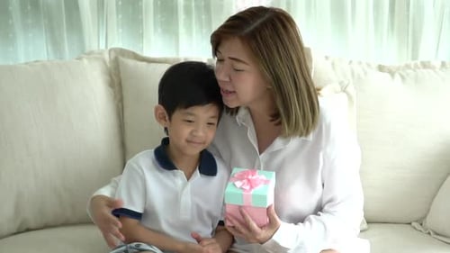 Mother Receives Gift From Her Smiling Child