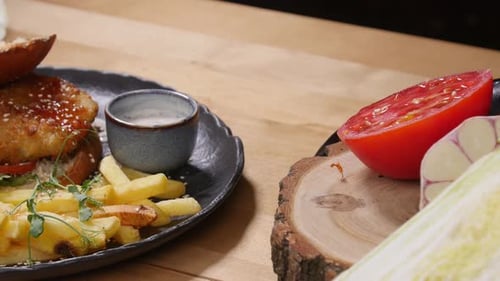 Close Up of an Open Burger and Fries