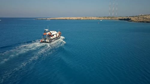 Pleasure Boat on Sea Waves
