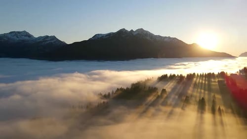 Mountains and Clouds at Sunrise from Aerial View