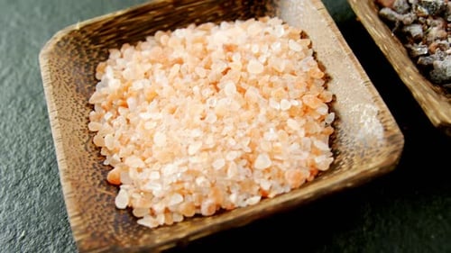 Halite and black salt in bowl 4k