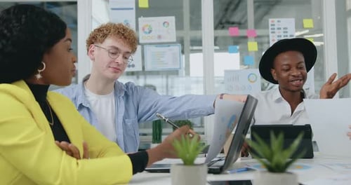 Colleagues Meeting to Discuss Business Growth in Office