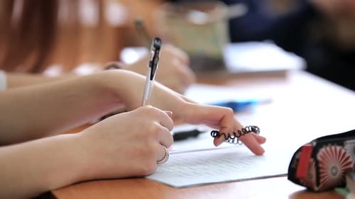 High School Teenage Students at the Desk