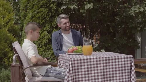 Family Gathering for Birthday Celebration Outdoors