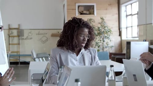 Engaged Businesswomen Collaborating During a Meeting