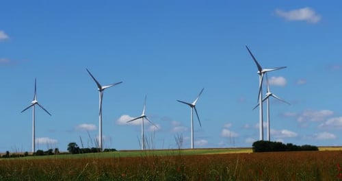 Wind Turbines with Blue Sky, near Caen in Normandy, Real Time 4K