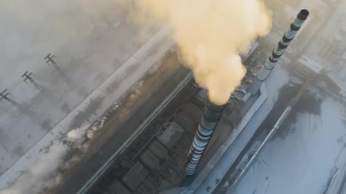 Aerial View of Coal Power Plant High Pipes with Black Smoke Moving Up Polluting Atmosphere at