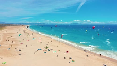 Aerial View of Kitesurfing Extreme Sport with the Wind Freestyle. Beautiful Top View of Nice Beach