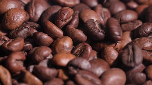 Pile of Rich, Roasted Coffee Beans Close Up