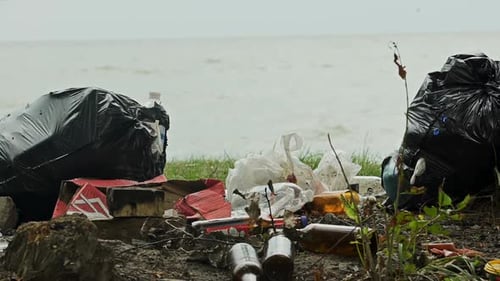 Polluted Beach with Trash and Debris