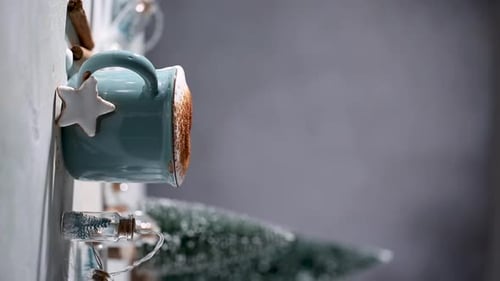 Filling a Christmas Mug with Mini Marshmallows