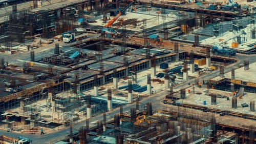 Time Lapse of Construction Site with Heavy Construction Machinery in Metropolis