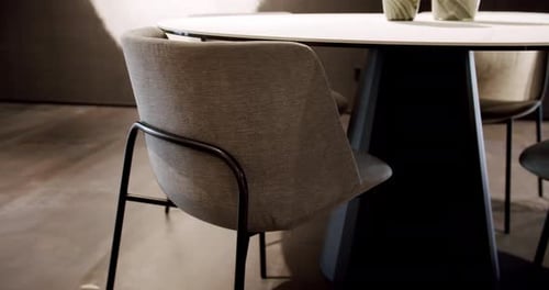 Close Up Fabric and Textile Modern Brown Gray Chair with Round Dinner Table