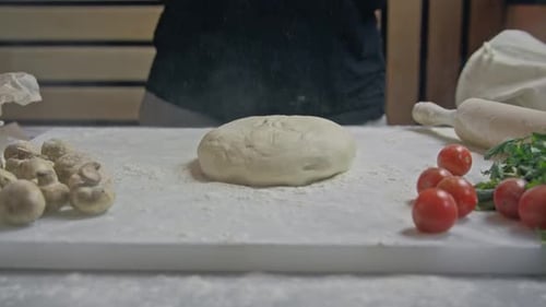 Senior Professional Chef Kneading Floured Dough at Bakery Mature Retiree Enjoying Hobby Making