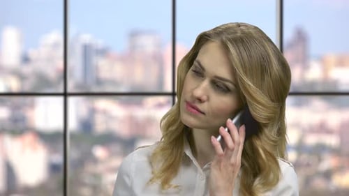 Close Up Young Business Woman Talking on Cell Phone.