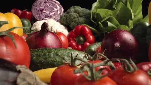 Assortment of Fresh Vegetables Zooming to Red Pepper